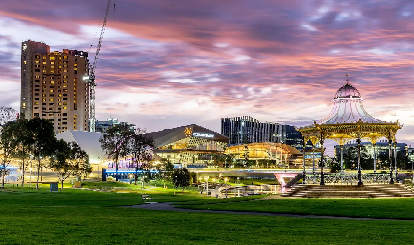 Adelaide park with a lit rotunda at dusk